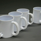 Illustration for article titled Link Mugs Let You Carry Six Cups at a Time